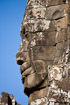 Enormous carved stone face above a gate at Bantey Kdei near Angkor Wat