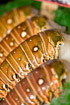 Brightly-coloured lobster tails on sale in the fish market of Pike Place, Seattle